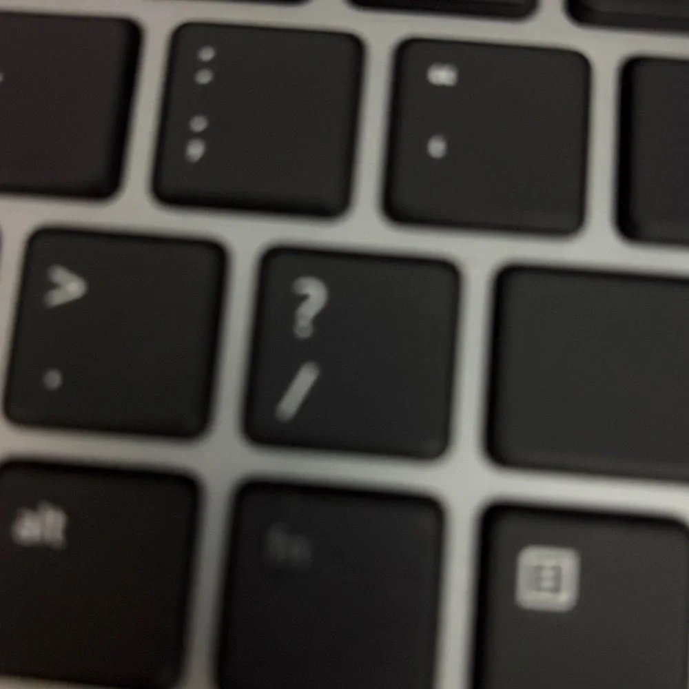 Sleek Black and Silver Laptop Keyboard
